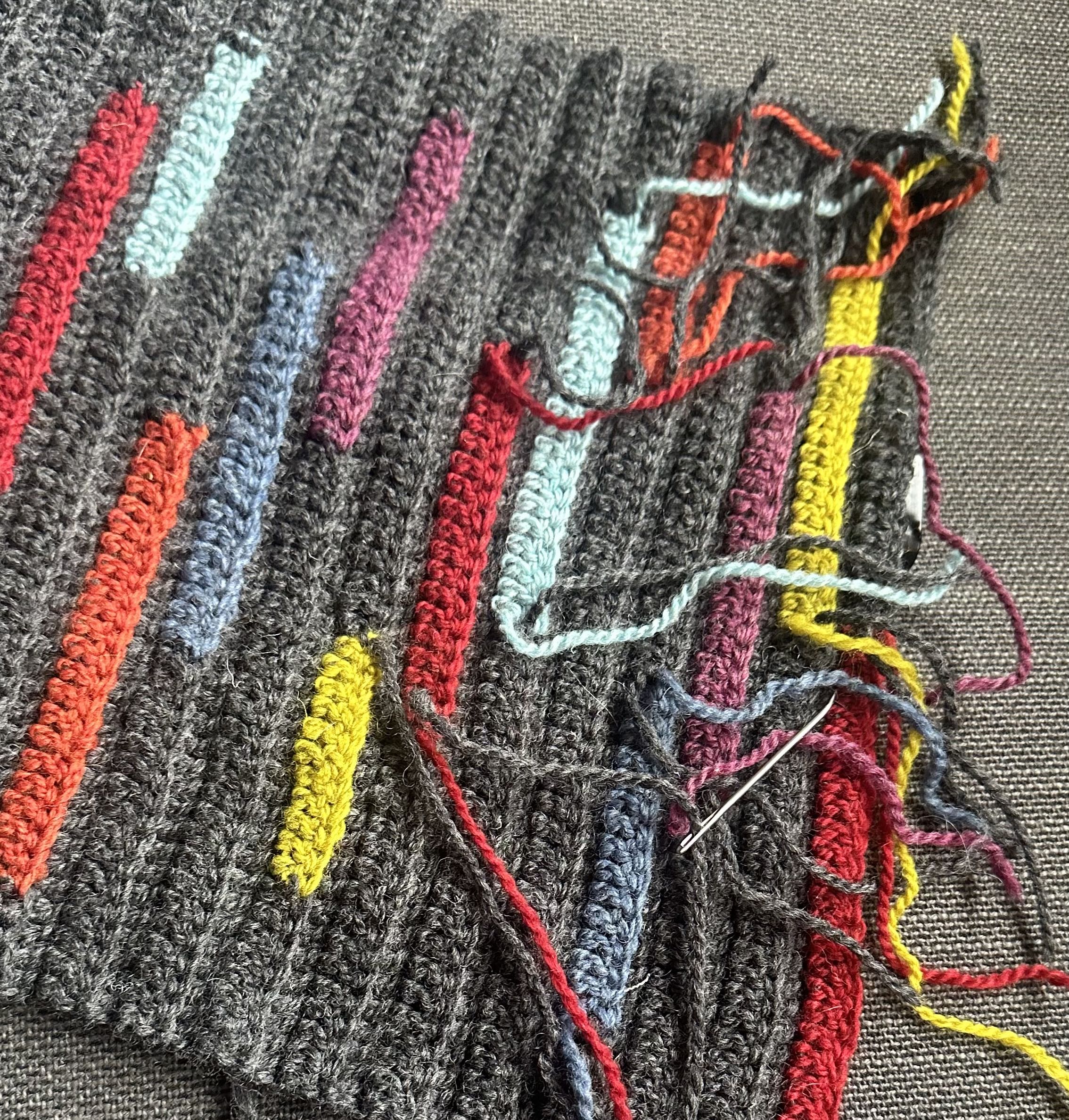 A woven hat in warm fall colors